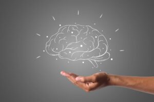 ציור של מוח מעל כף יד – הסבר על שיטת NLP